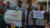 عمال إغاثة في شمال غرب سوريا يحتجون على احتمال تحكم الحكومة السورية بدخول شحنات المساعدات الإنسانية
