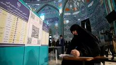Iran began voting Friday with questions looming over just how many people will turn out for the poll