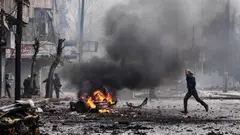 Wreckage and debris are seen after a car bomb exploded at a crowded petrol station in Barzeh al-Balad district in Damascus, in this handout photograph released by Syria's national news agency SANA on January 3, 2013 (photo: dapd)