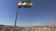 Rebel Flag over Aleppo (photo: AP)