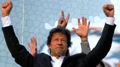 Pakistani cricketer turned politician and head of Pakistan Tahreek-e-Insaf or Movement for Justice Party Imran Khan waves to his supporters during a rally in Lahore, Pakistan, 30 October 2011 (photo: AP)