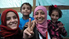Yemeni women's rights and democracy campaigner Tawakkul Karman, 32, one of the three recipients of the 2011 Nobel Peace Prize, reacts as she receives congratulations from protesters inside her tent at a protester camp in Sana'a, Yemen, 8 October 2011 (photo: dapd)