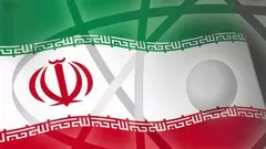 The symbol for nuclear power superimposed on the Iranian flag (source: AP)