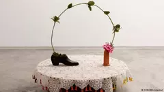 Art installation by Nilbar Gures: shoe, rose and dildo (photo: Schwules Museum)