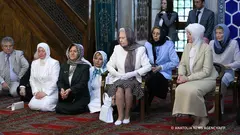 When she ascended the throne, millions of Muslims still lived under British rule. Later, Elizabeth II appealed for tolerance in a multi-religious society.