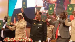 "The terrible mistakes made by the civil protest leaders who agreed to sit down and talk to the military, when the popular revolution was at its height, are too many to count," writes Ali Anouzla. Pictured here: army chief Abdel Fattah al-Burhan (centre) and RSF leader Mohamed Hamdan Dagalo (second from left) last December, before hostilities began