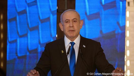 Israeli Prime Minister Benjamin Netanyahu addresses a ceremony marking Memorial Day for fallen soldiers of Israel's wars and victims of attacks, Jerusalem's Mount Herzl military cemetery, 13 May 2024