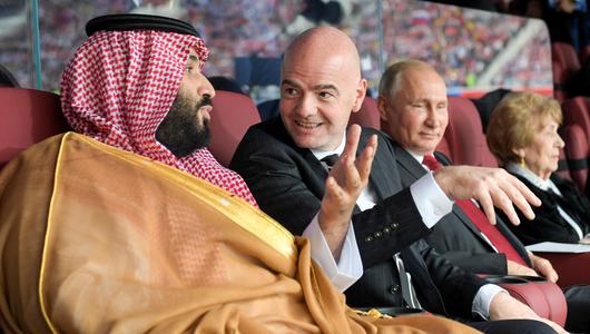 Saudi Arabia's Crown Prince Mohammed Bin Salman Al Saud, FIFA President Gianni Infantino, and Russia's President Vladimir Putin (L-R) at the opening ceremony of the 2018 FIFA World Cup at Luzhniki Stadium, Moscow, Russia, June 14, 2018 